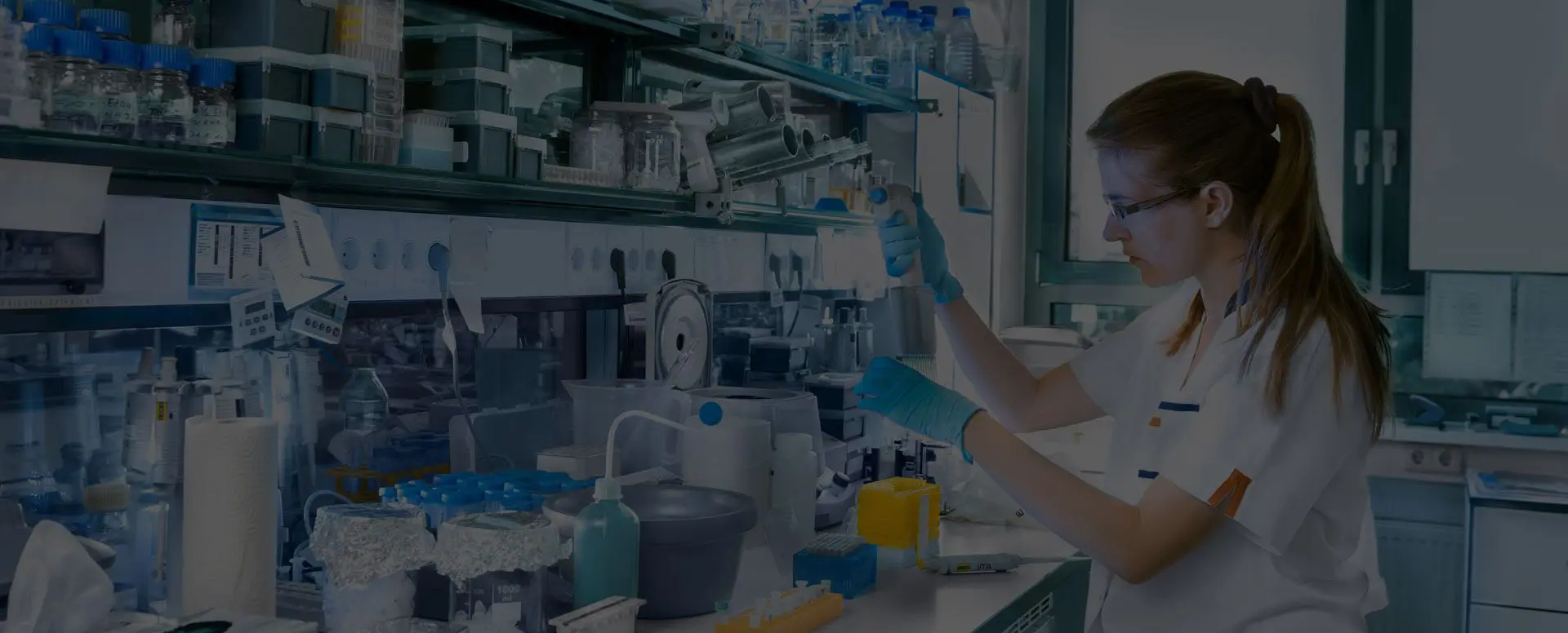 A woman is working in a Biological Engineering laboratory.